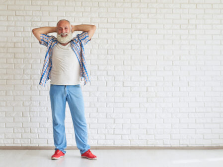 Man in red sneakers, senior sales expert, selling older adults homes